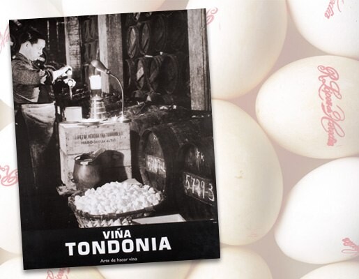 Viña Tondonia brochure showing egg whites used to clarify the wine, set against farm eggs