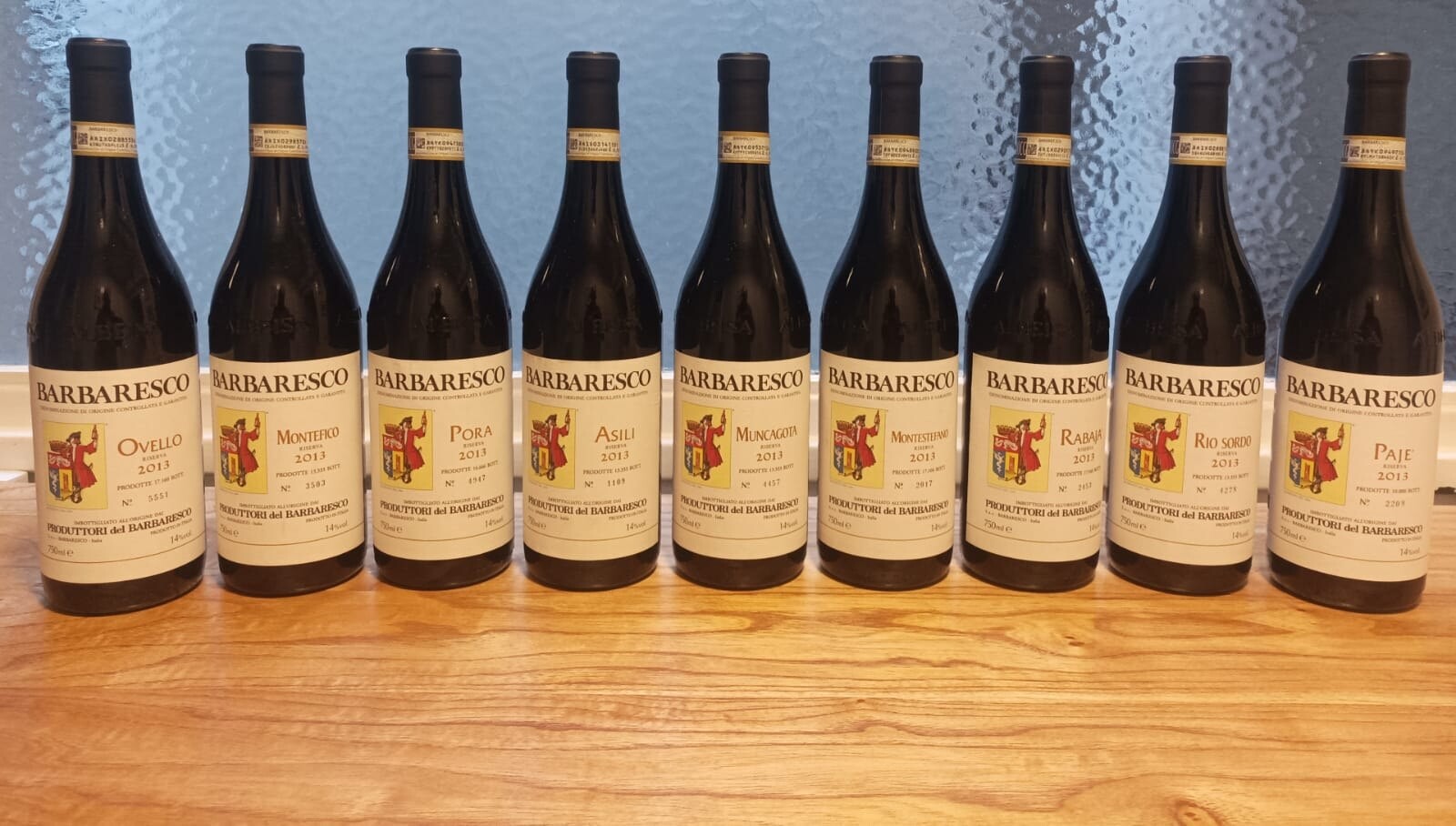 The nine 2013 Produttori del Barbaresco Riserva Crus lined up, showing the numbered front labels